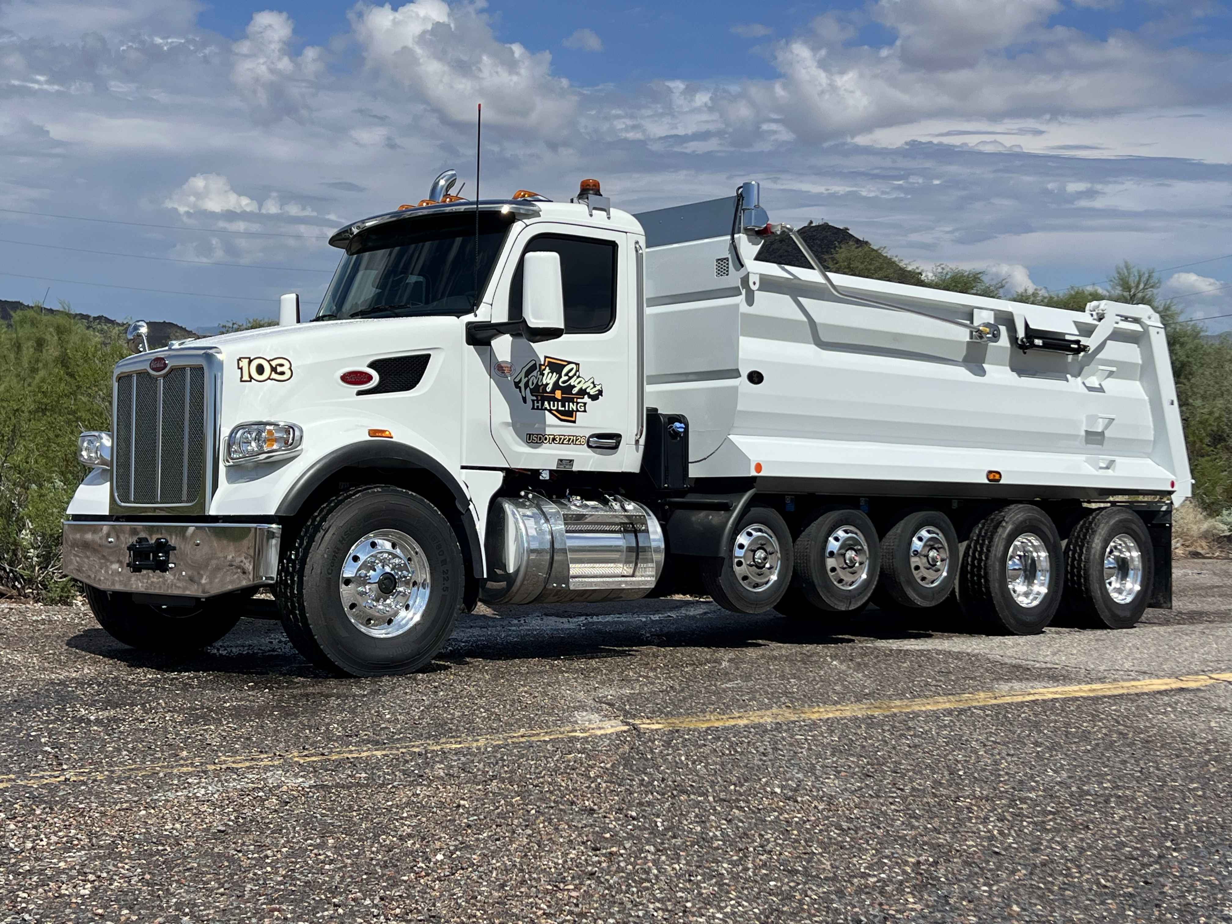 48 Hauling truck in action - job site